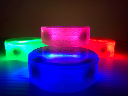 The Comet Puck ICE 4-Pack. Regulation 6oz. L.E.D. Light Up Ice Hockey Pucks. Slap-Shot Ready.